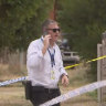 Police at the scene of a fatal house fire in Maryborough on Thursday afternoon.