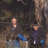 Police search the Coonabarabran property where the boys’ bodies were found.