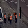 A truck failed to clear a level crossing when it was hit by a train just before 4pm