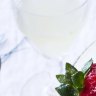 Limoncello mousse topped with berries and served with optional coconut wafers (left).