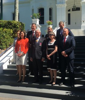 Queensland Premier Annastacia Palaszczuk with members of her reshuffled cabinet at Government House on Friday.