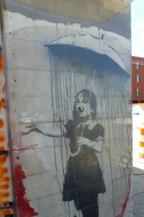 "Rain Girl" – one of three remaining Banksy portraits in New Orleans.
