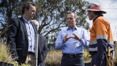 Prime Minister Tony Abbott speaks with members of Greening Australia after the  launch of the Cumberland Woodlands Round.
