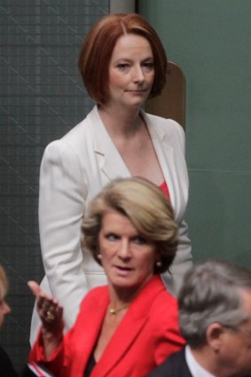 Gillard passes and Bishop in 2011.