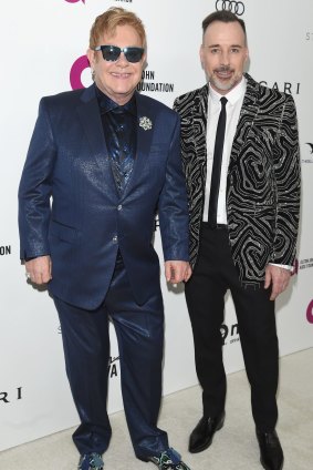 Elton John and his husband of 11 years, David Furnish, last month.