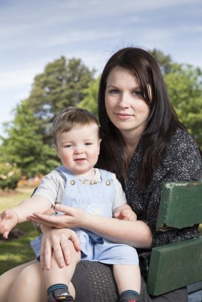 Louise Frame with son Ryan, 16 months, in the rose garden near Old Parliament House. Ms Frame accessed help from a Canberra post-natal depression support group as she struggled following Ryan's birth.