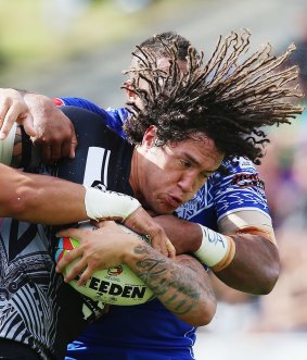Kevin Proctor of New Zealand charges forward during the Four Nations match.