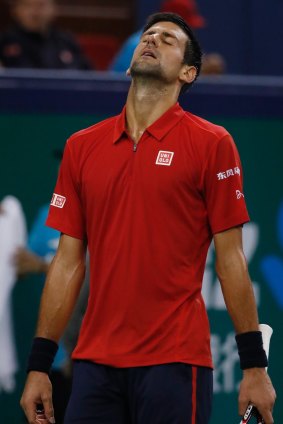 Novak Djokovic of Serbia reacts during the men's singles semifinals match against Roberto Bautista Agut.