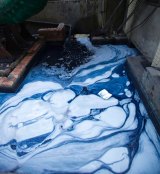 The wastewater of a jeans factory in Xingtang, Zengcheng, in China. 