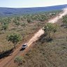 Driving the dusty Gibb River Road.