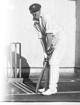 Donald Bradman relaxed as the bowler approaches the crease.