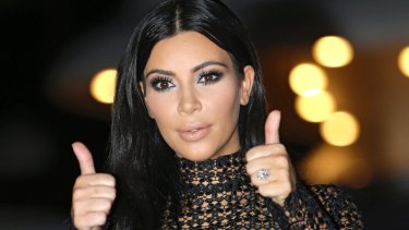 Thumbs up for natural? Kim Kardashian.