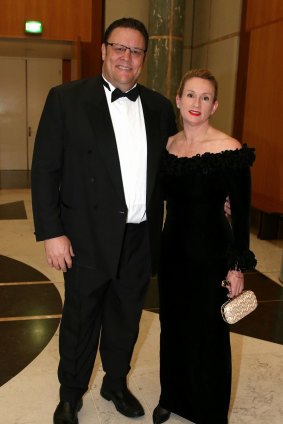 Arriving with wife Tess for the Midwinter Ball at Parliament House in June.