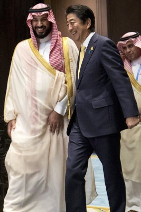He gets around. Crown Prince Mohammed bin Salman, left, and Japanese Prime Minister Shinzo Abe.