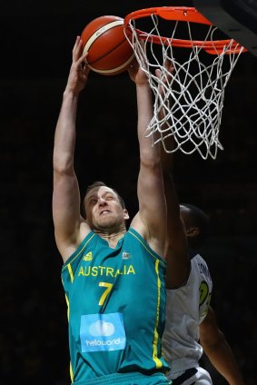 Joe Ingles gets old-school with a dunk on the opening play.