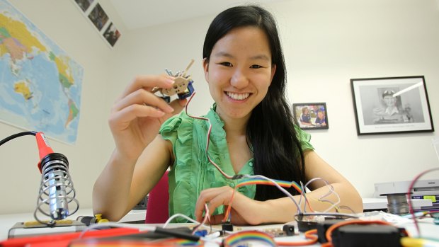 Young Australian of the Year, Marita Cheng assembling a robot at Melbourne University last year.