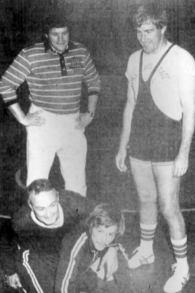 This October 25, 1975 photo, taken from a newspaper page, Yorkville, Illinois, shows high school wrestling coach and former US House Speaker Dennis Hastert, top left.