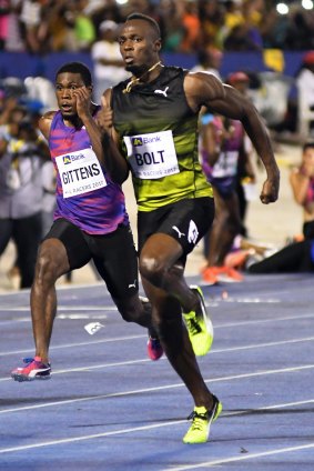 Usain Bolt sprints past competitors.