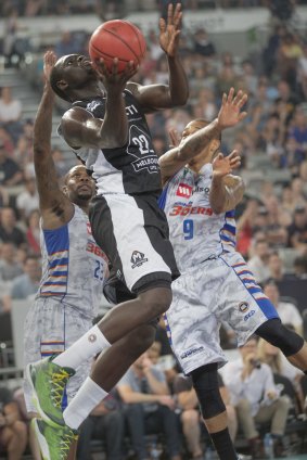Melbourne United's Majok Majok powers up to the basket in Sunday's game.  