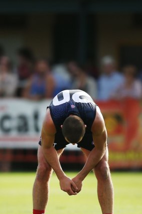 A dejected Colin Garland reacts after missing a goal against Port Adelaide.