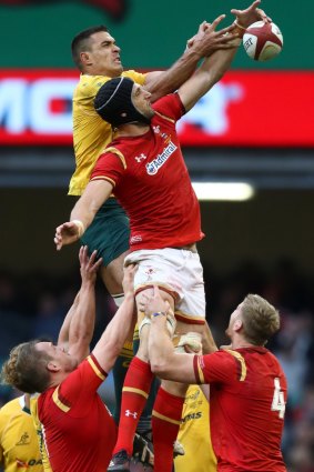 Rory Arnold and Luke Charteris of Wales battle for lineout ball.