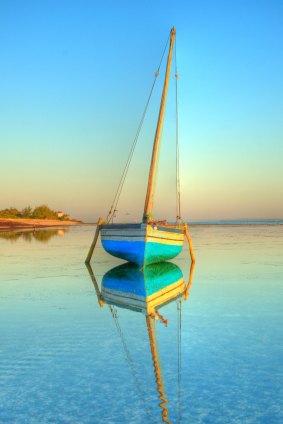 Dhow on the water on a picture-perfect morning.