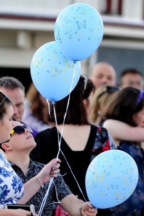 Cathy's son, Keane about to release three balloons in memory of his mother.