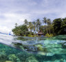 Water world ... a beach bungalow at Sanbis resort on Gizo Island.