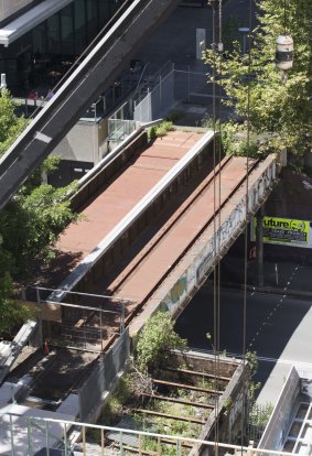 The former freight railway track being converted into a pedestrian and cycling connection linking Darling Harbour and Central was expected to open alongside the UTS business school this week.