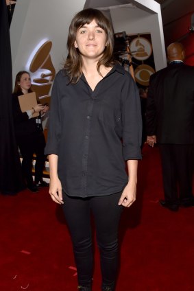 Courtney Barnett opted for a dressed-down look in a black blouse, skinny jeans and ankle boots for her first Grammy Awards show.
