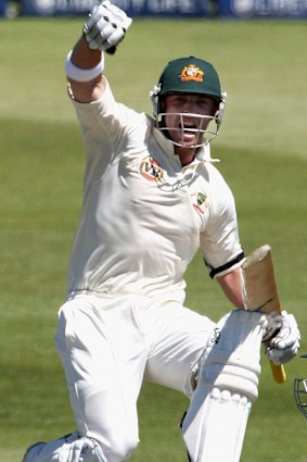 Phil Hughes celebrates his maiden Test century against South Africa in 2009.