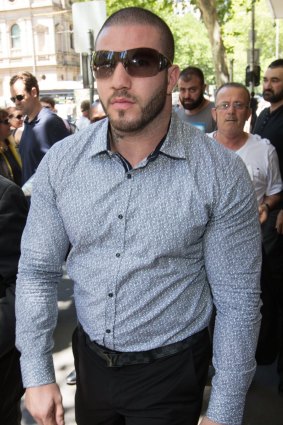 Kickboxer Suleiman Abdulrahim charged over Reservoir crash that killed elderly woman seen here leaving the Melbourne Magistrates Court.