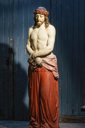 Warehouse 8 Interiors auction: 19th-century life-size statue of Jesus which sold for $12,200 IBP.