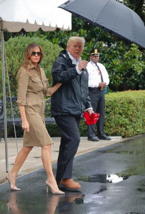 President Donald Trump and first lady Melania Trump leave Washington to head to a meeting with victims of the Texas floods.