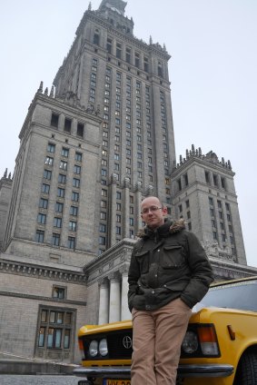 Soviet remnant: Warsaw tour guide Marek Sidorenko outside the huge ex-Soviet Palace of Science and Culture in the middle of Warsaw.