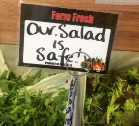 A supplier delivers a positive message about salads at the Prahran Market in Melbourne. 