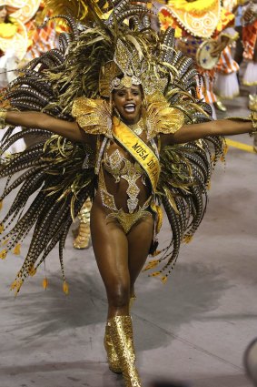 A dancer from the Unidos do Peruche samba school performs during a carnival parade in Sao Paulo, Brazil.