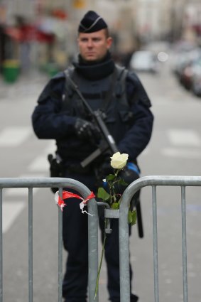 Armed police guard the Bataclan Theatre after Friday's terrorist attack.