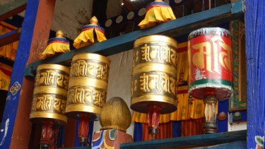 Spinning a prayer wheel helps accumulate wisdom and good karma in Bhutan.
