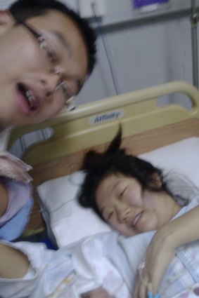 Liang Xuyang with wife Melinda Meng and their new baby.

