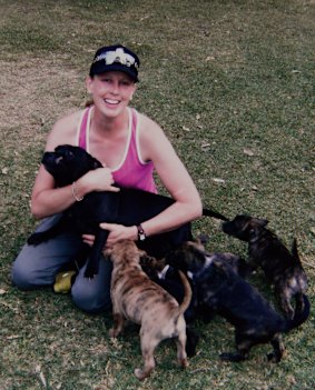 Happier times: Imogen with her dogs in 2009.