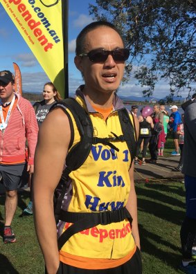 Kim Huynh, independent candidate in the ACT election 2016, at the end of the 10km Canberra Times Fun Run on Sunday.