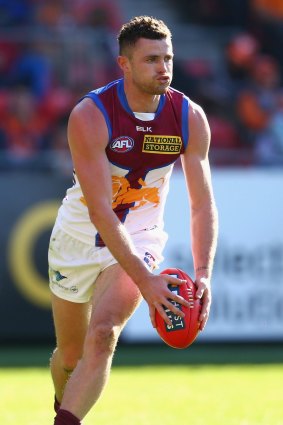 Pearce Hanley runs the ball in the round 10 clash with GWS.