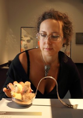 Julia de Ville at the South Australian Museum with her work, <i>Neapolitan Bonbonaparte</i>.