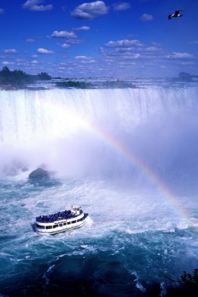 Canada, Ontario, Niagara Falls, the Maid of the Mist at the bottom of Canadian fall