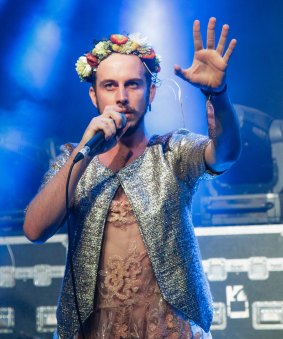 In true Woodfordian form, Brendan Maclean dons a flower drown and dress while performing at Tropic.