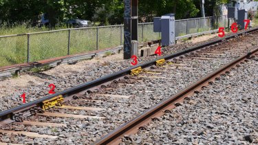 Insiders say safety standards have deteriorated under Metro, with emergency 'fishplates', seen here at Alphington, used instead of new tracks.       