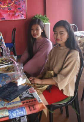 "It makes me hang my head in shame": Neidonu Nuh, left, and a friend discuss women's rights in Nagaland at a Kohima cafe.