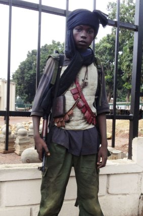 A child soldier fighting for the Seleka movement in Central African Republic in March 2013.