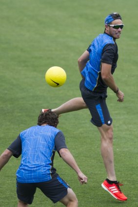 New Zealand fast bowler Tim Southee kicks a soccer ball around on Manuka Oval on Wednesday.